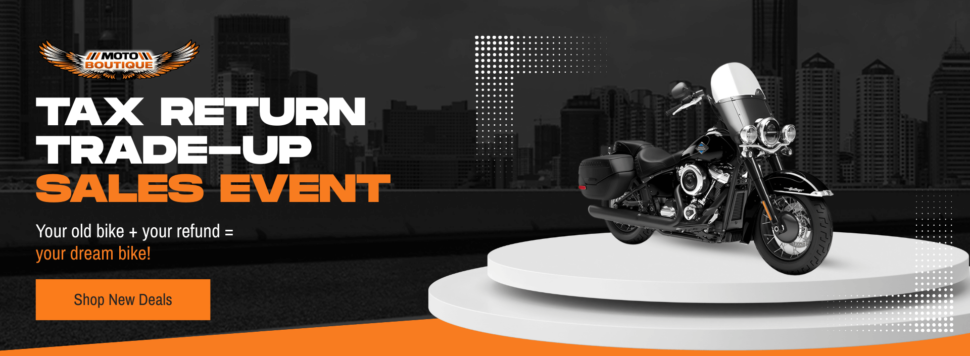Moto Boutique Tax Return Trade-Up Sales Event featuring a touring motorcycle on display.